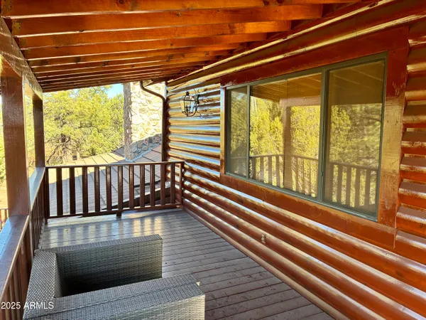 a vase of flowers sitting on a floor