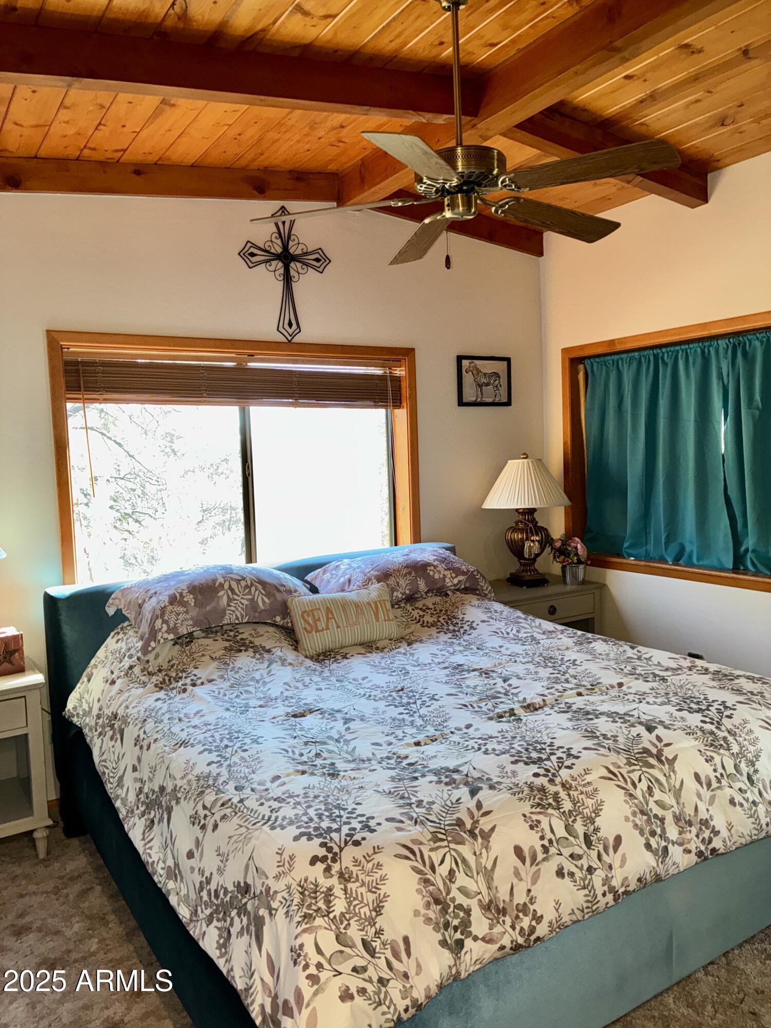 2761 Apollo Circle Overgaard, AZ 85933 - Photo 6 of 52 a bedroom with a bed and a window