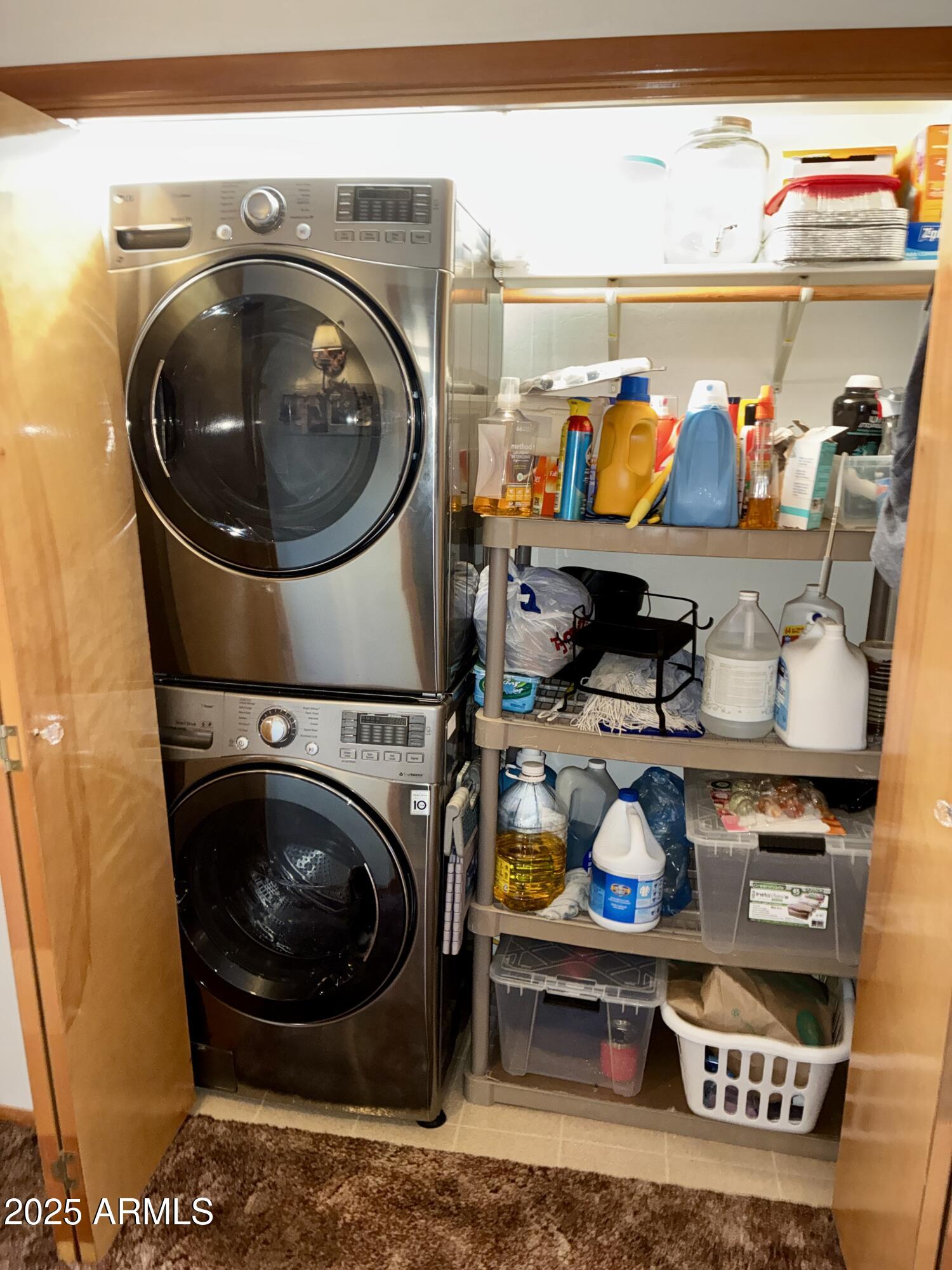 2761 Apollo Circle Overgaard, AZ 85933 - Photo 10 of 52 a utility room with stainless steel appliances and toys