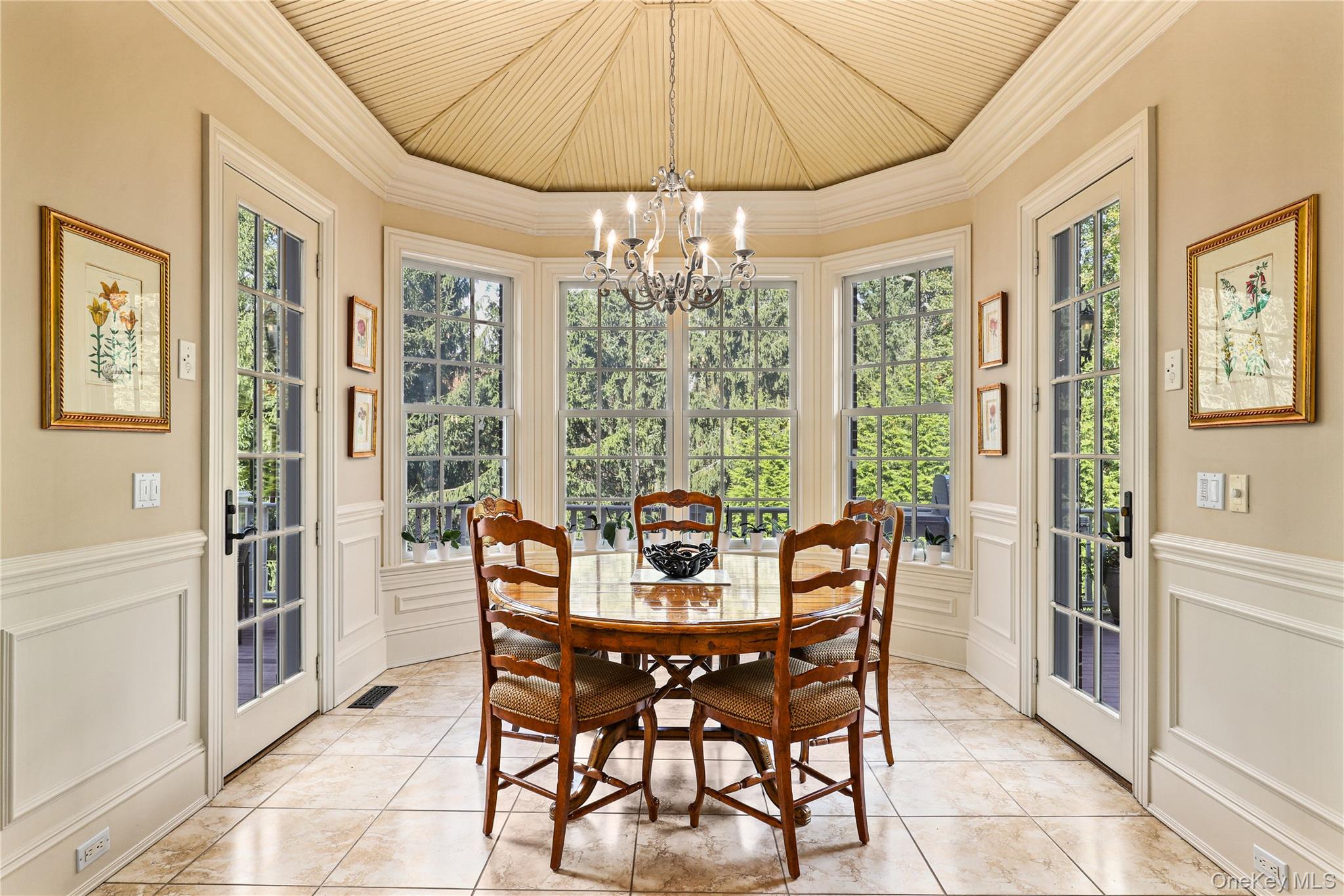 3 Brook View Lane Rye, NY 10580 - Photo 13 of 49 a dining room with furniture a chandelier and wooden floor