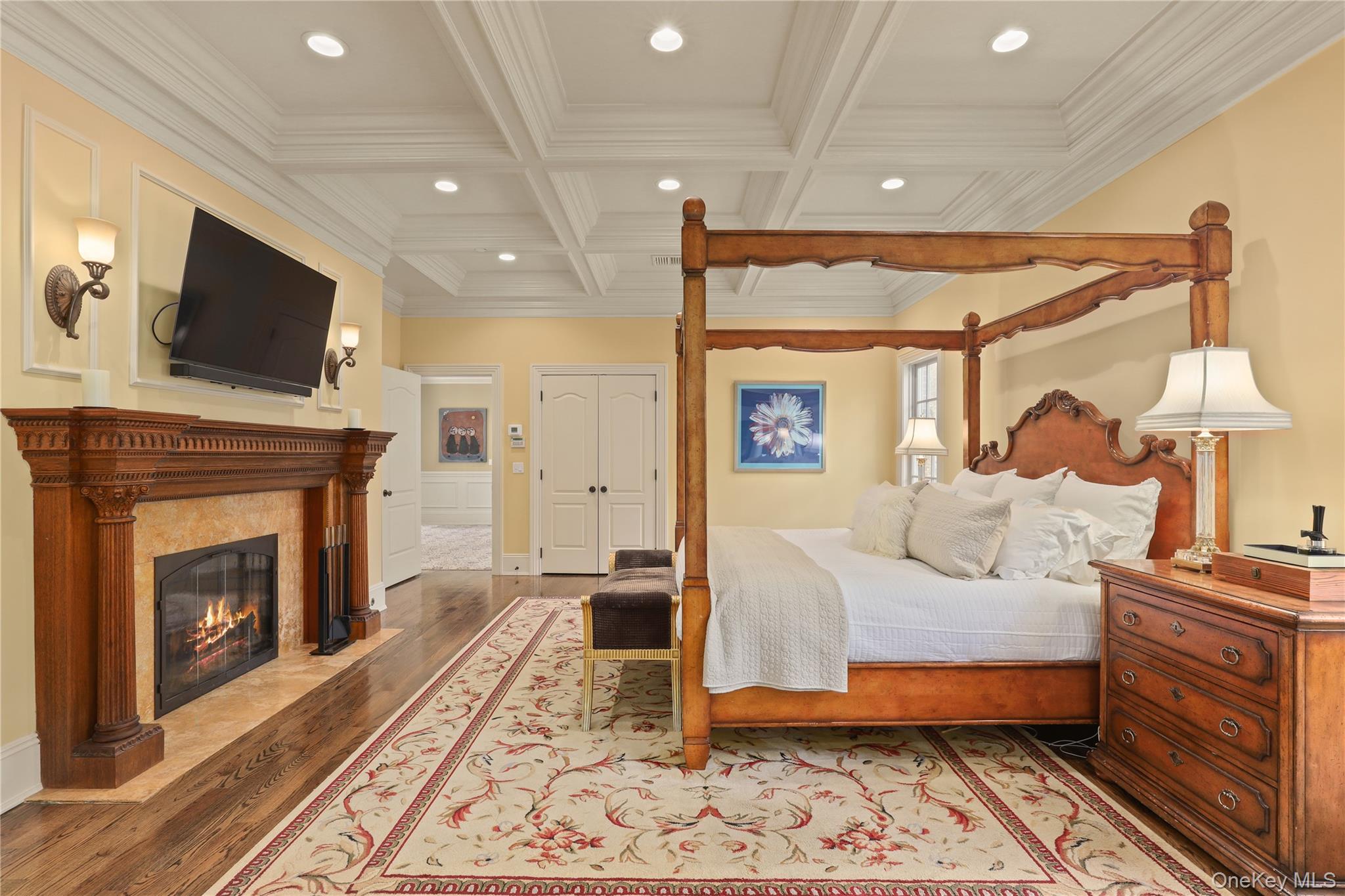 3 Brook View Lane Rye, NY 10580 - Photo 23 of 49 a bedroom with a bed and a fireplace