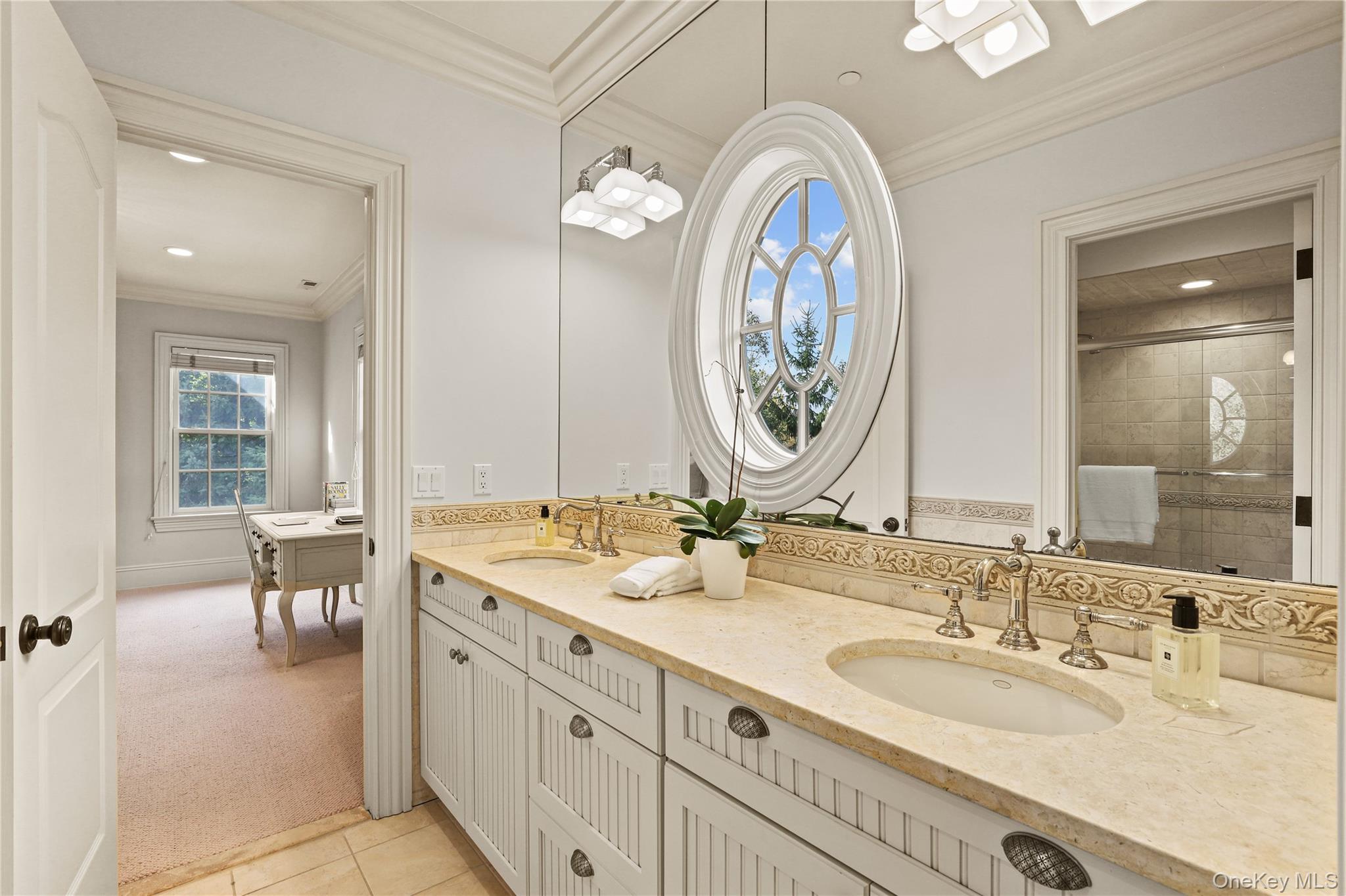 3 Brook View Lane Rye, NY 10580 - Photo 31 of 49 a bathroom with double vanity sinks and a mirror