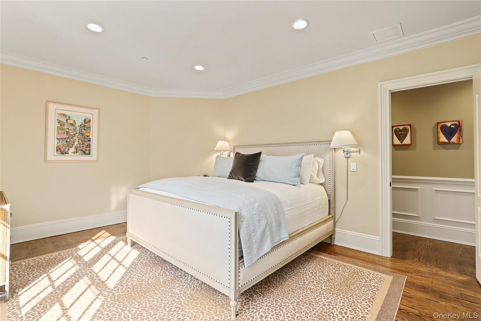 3 Brook View Lane Rye, NY 10580 - Photo 33 of 49 a bedroom with a bed and wooden floor