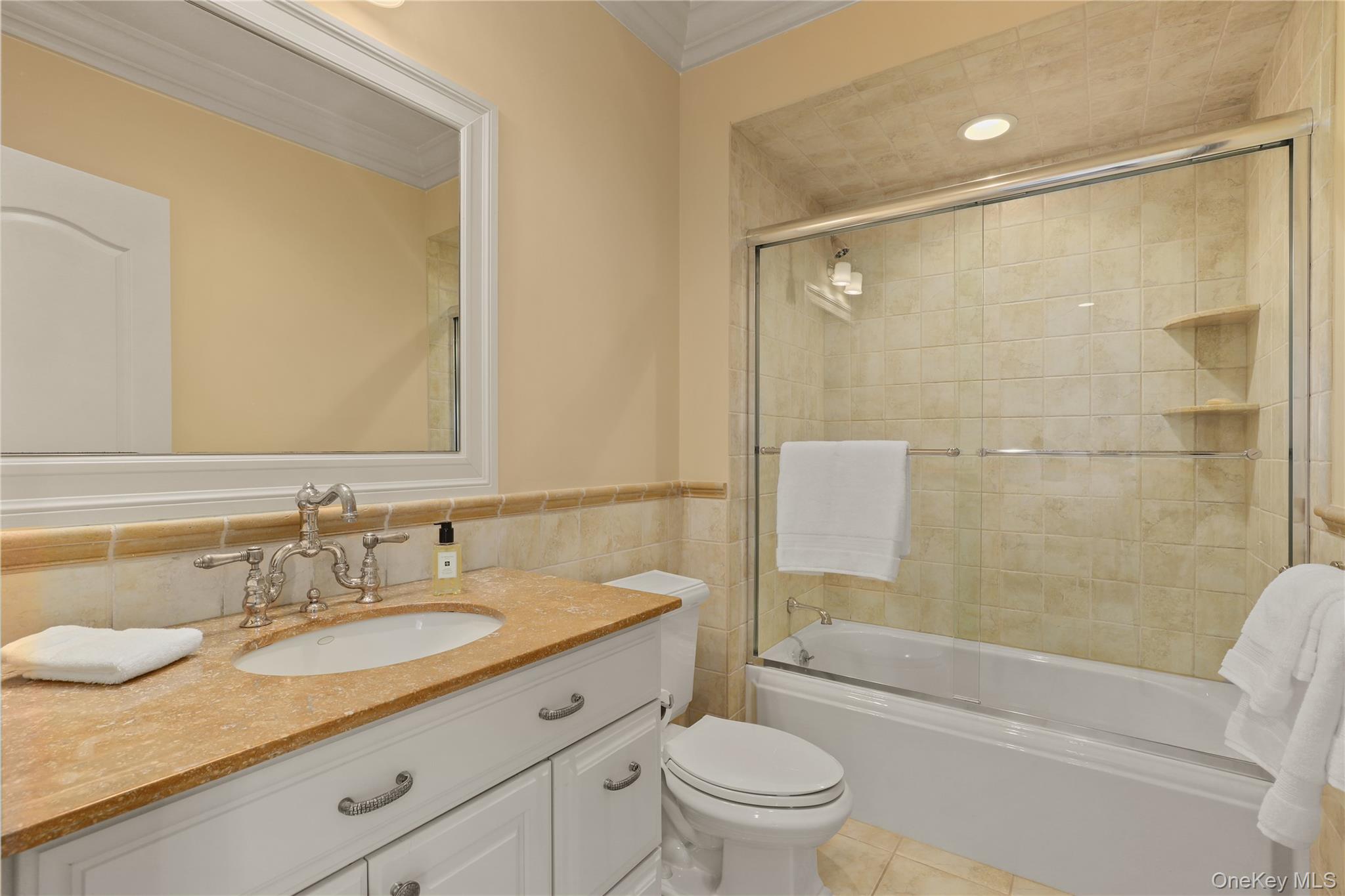 3 Brook View Lane Rye, NY 10580 - Photo 34 of 49 a bathroom with a granite countertop sink toilet and shower