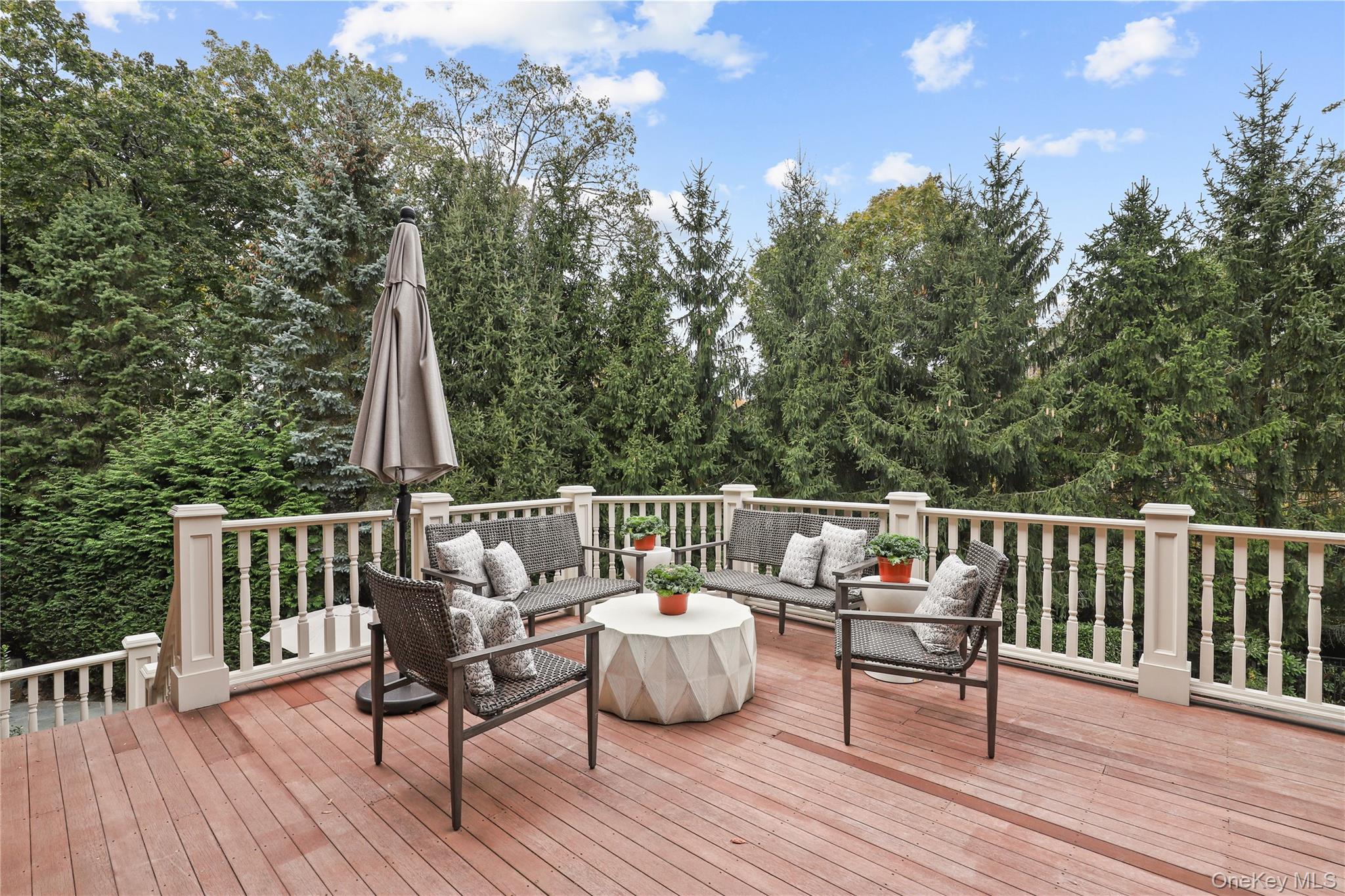 3 Brook View Lane Rye, NY 10580 - Photo 44 of 49 a view of balcony with furniture and wooden floor