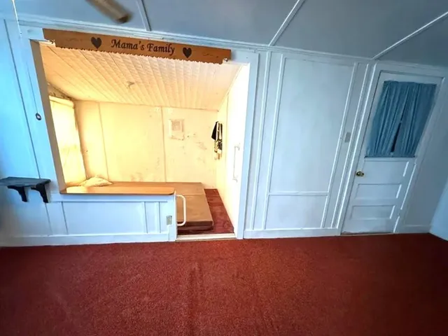 a view of walk in closet with window
