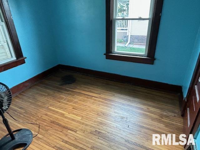 712 Roosevelt Avenue Kewanee, IL 61443 - Photo 7 of 21 a view of a room with wooden floor and a window