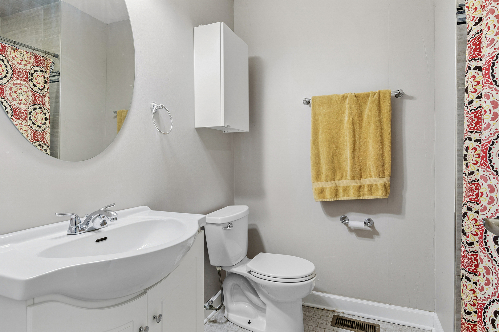 313 Thistle Drive Bolingbrook, IL 60490 - Photo 15 of 23 a bathroom with a toilet sink and mirror
