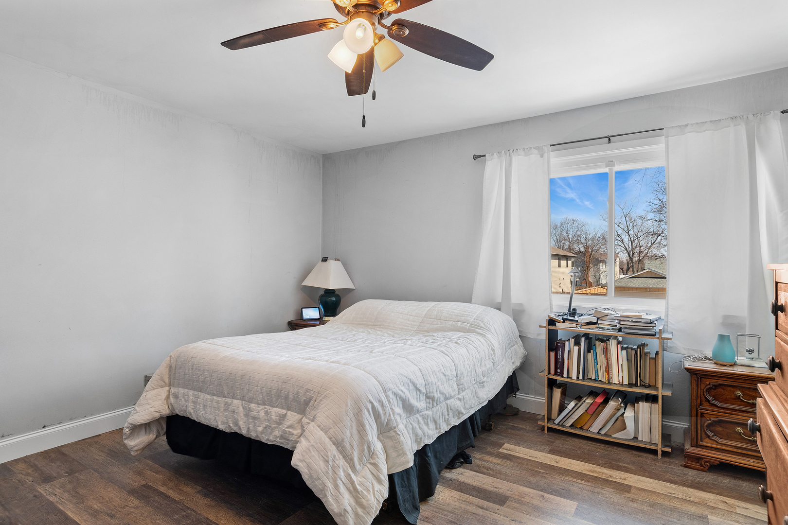 313 Thistle Drive Bolingbrook, IL 60490 - Photo 8 of 23 a bedroom with a bed and wooden floor