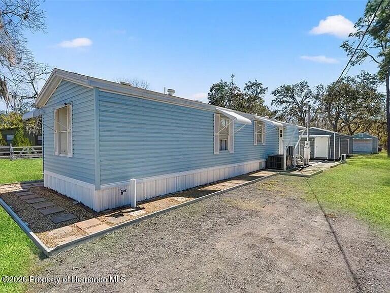 12222 Beagle Road Hudson, FL 34667 - Photo 2 of 29 dce6f1c8cdb4110d7d23849af92cf648-cc_ft_7