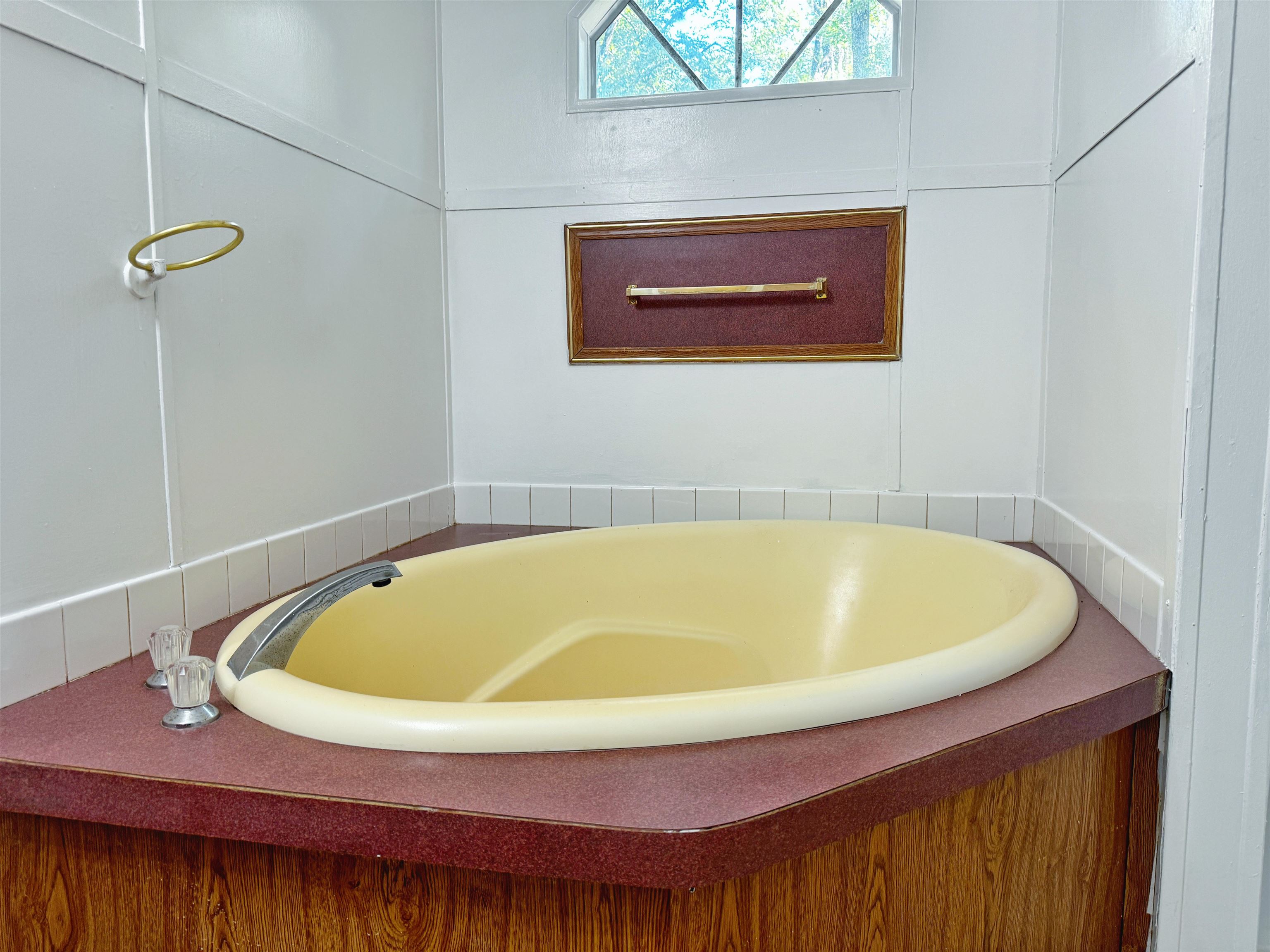 5872 Pine Creek Drive St. Augustine, FL 32092 - Photo 14 of 26 a view of a bathtub in a bathroom