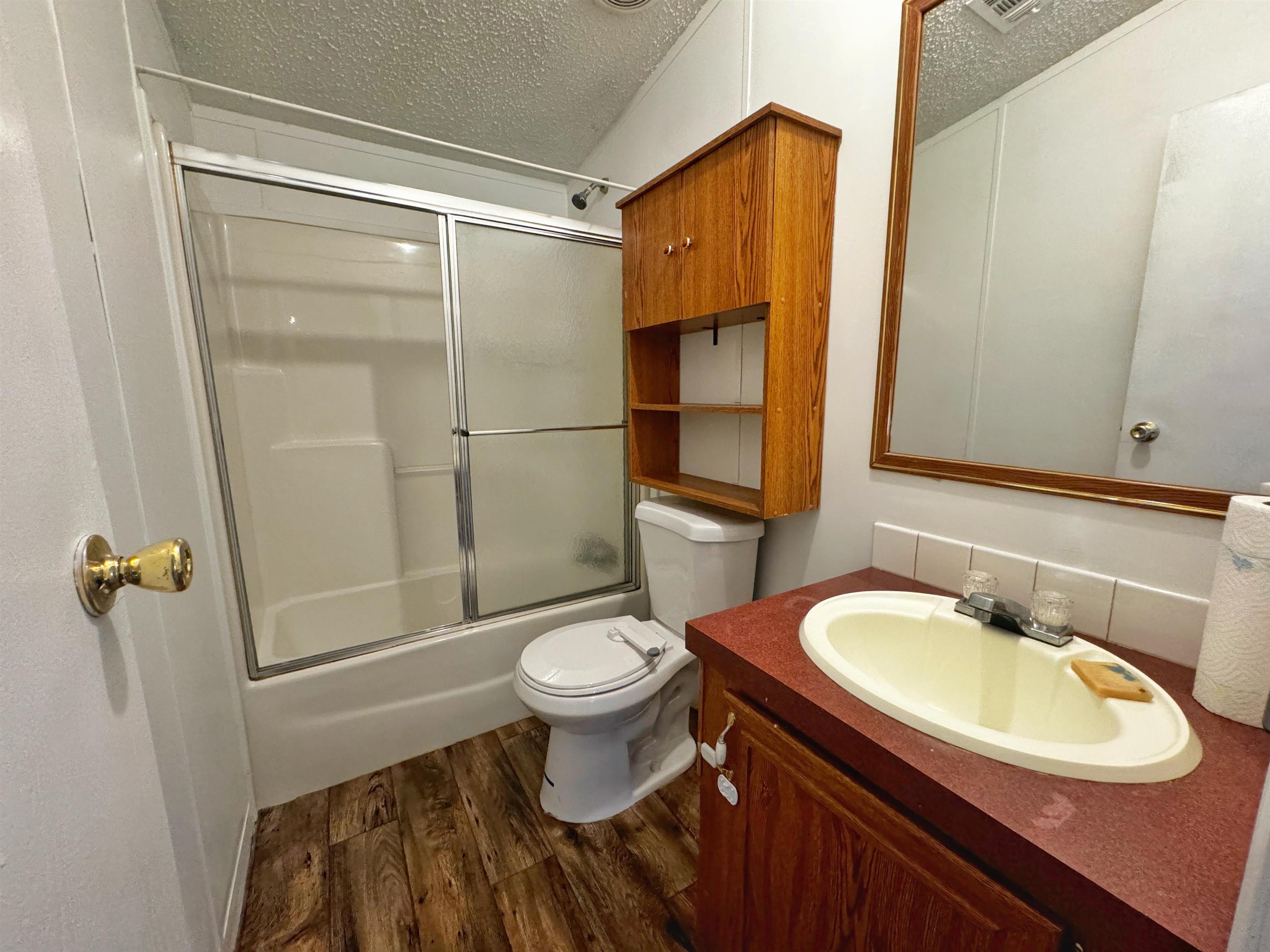 5872 Pine Creek Drive St. Augustine, FL 32092 - Photo 17 of 26 a bathroom with a sink toilet and shower