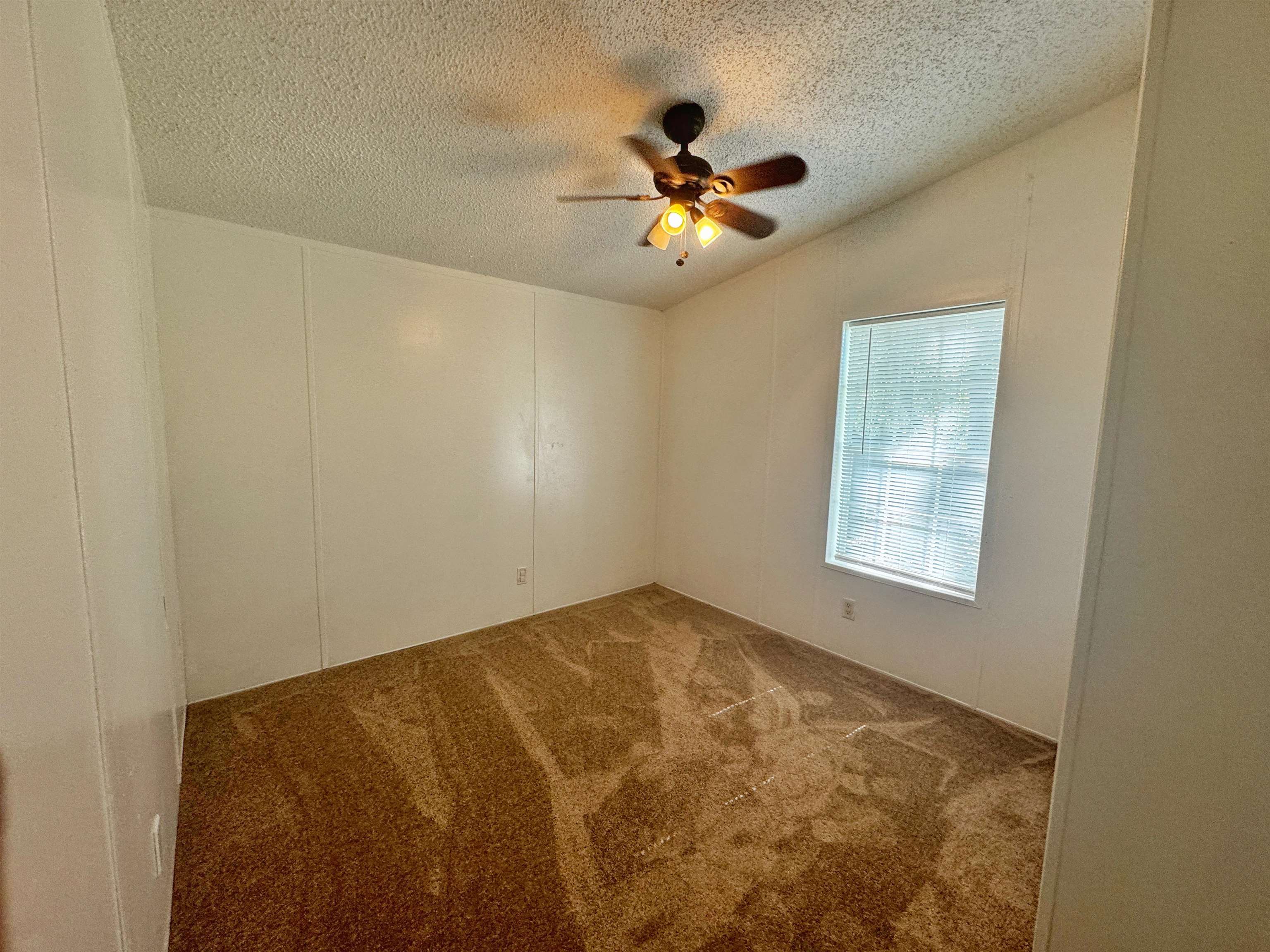 5872 Pine Creek Drive St. Augustine, FL 32092 - Photo 18 of 26 a view of empty room with window