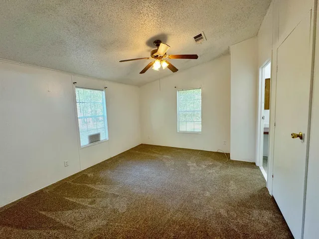 a view of a room with a window