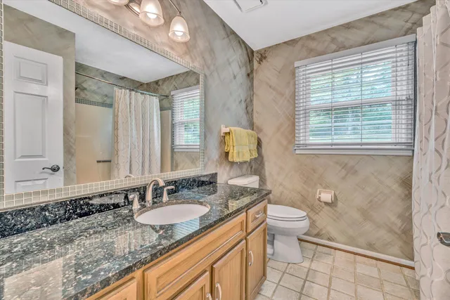 a bedroom with a bed and a closet