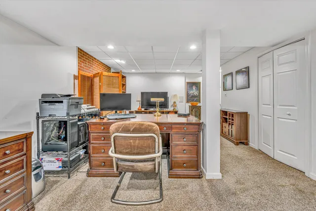 a bathroom with a sink a vanity and a mirror
