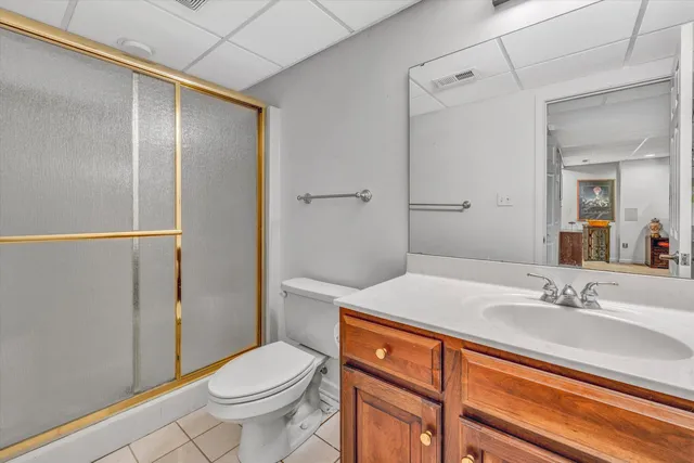 a view of a house with a yard and garage