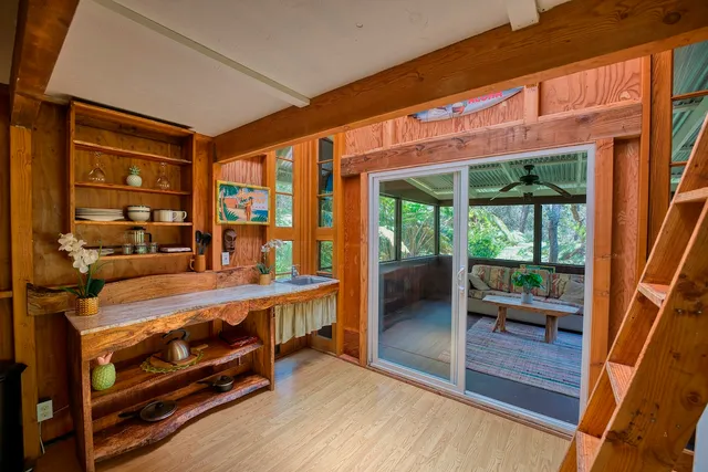 a view of a chairs and table in a patio