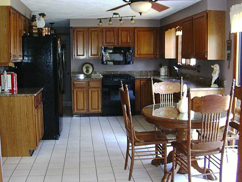 100 Log Road North Smithfield, RI 02830 - Photo 5 of 24 Kitchen. Gorgeous granite kitchen with dual fuel Dacor Stove & Bosch Dishwasher. Wait till you see the view from the dining area!