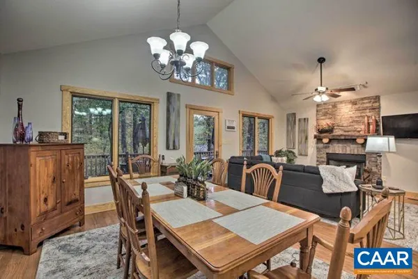 a large kitchen with a stove a sink and a refrigerator