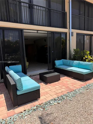 a view of swimming pool with patio