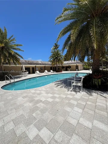 a view of a yard with furniture