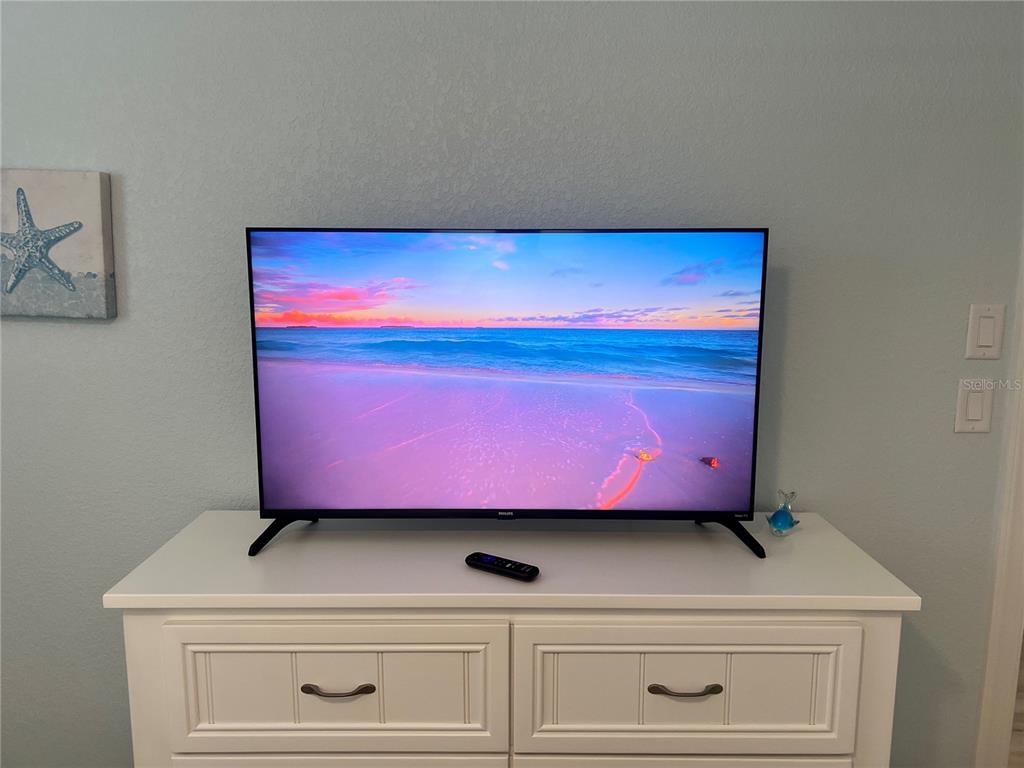 6154 Midnight Pass Road, Unit D16 Sarasota, FL 34242 - Photo 8 of 12 a close view of chair