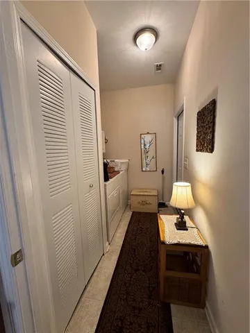 a bed room with a bed and a window