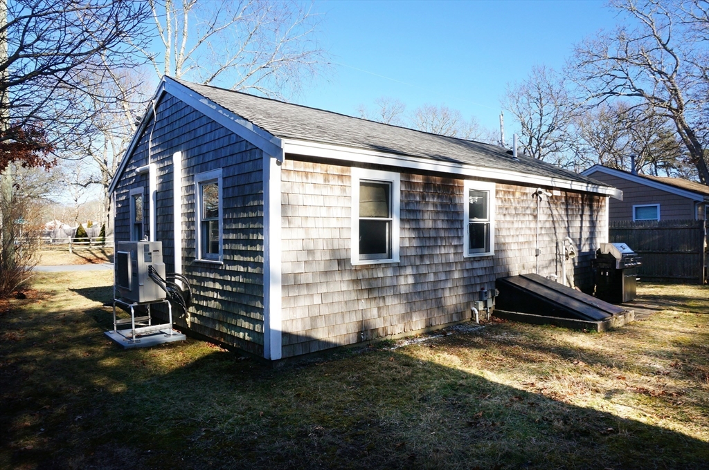 9 Circuit Road West Yarmouth, MA 02673 - Photo 17 of 23 a view of a house with backyard