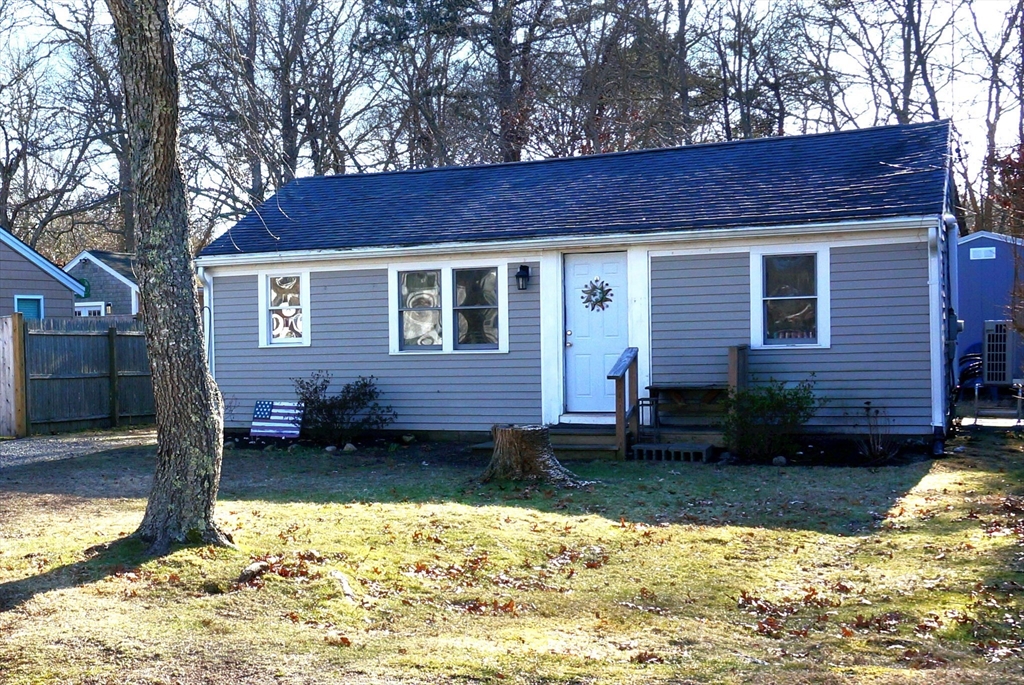 9 Circuit Road West Yarmouth, MA 02673 - Photo 2 of 23 a view of a house with a yard