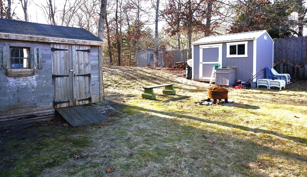 9 Circuit Road West Yarmouth, MA 02673 - Photo 21 of 23 a view of a house with backyard porch and furniture