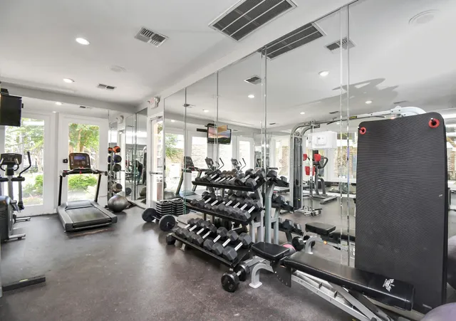 a view of a room with gym equipment