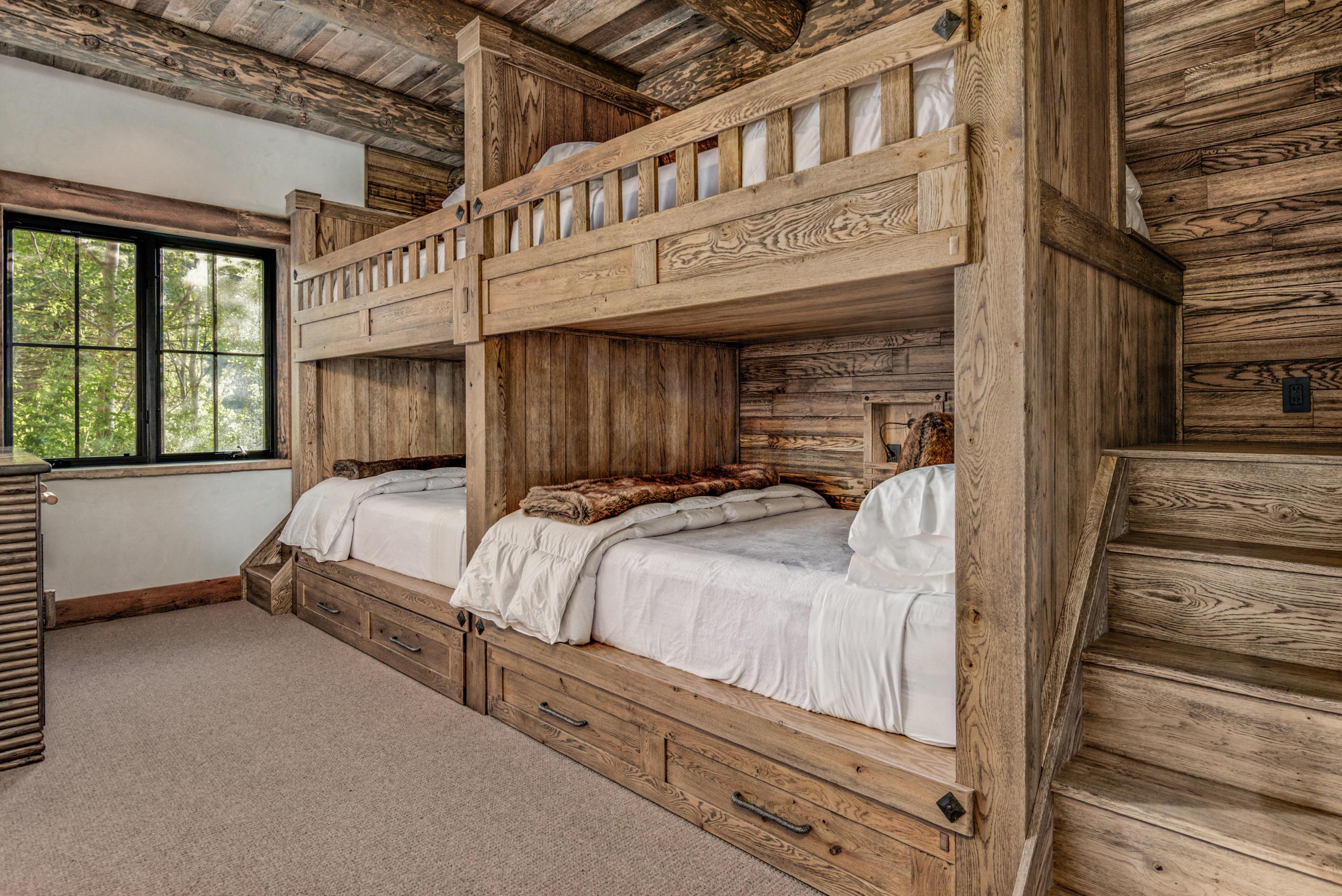 1580 Cresta Road Edwards, CO 81632 - Photo 20 of 25 a bed sitting in front of a building