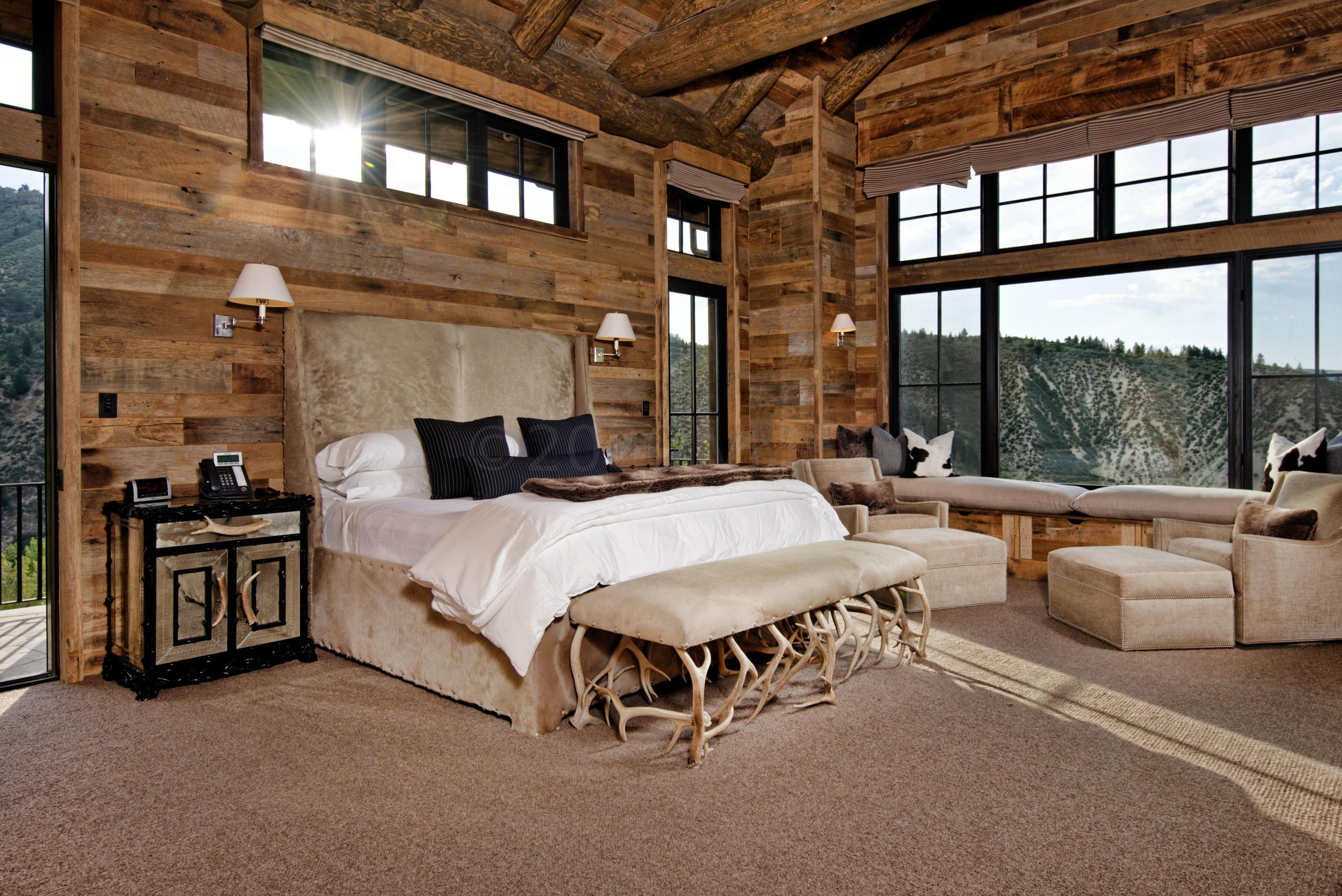 1580 Cresta Road Edwards, CO 81632 - Photo 6 of 25 a spacious bedroom with a bed and a large window