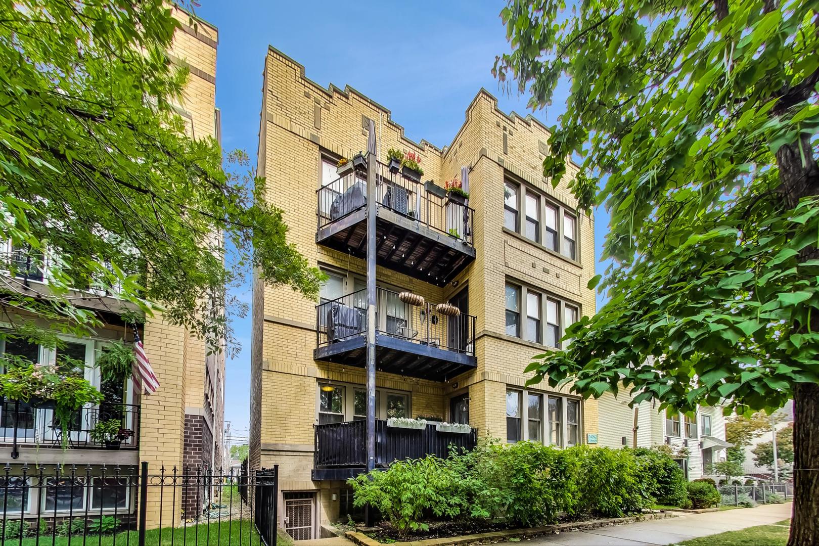 2142 West Addison Street, Unit 1A Chicago, IL 60618 - Photo 1 of 23 front view of a building