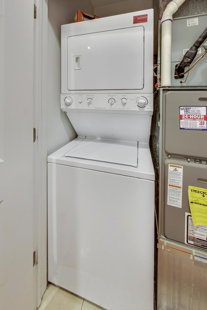 2142 West Addison Street, Unit 1A Chicago, IL 60618 - Photo 17 of 23 a utility room with dryer and washer