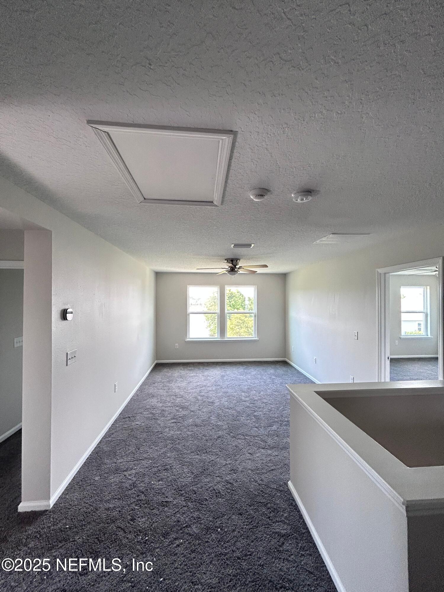 102 Bluejack Lane St. Augustine, FL 32095 - Photo 17 of 32 an empty room with windows