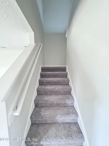 a bathroom with a bath tub and a shower