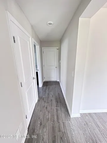 a close view of a stove a microwave and cabinets