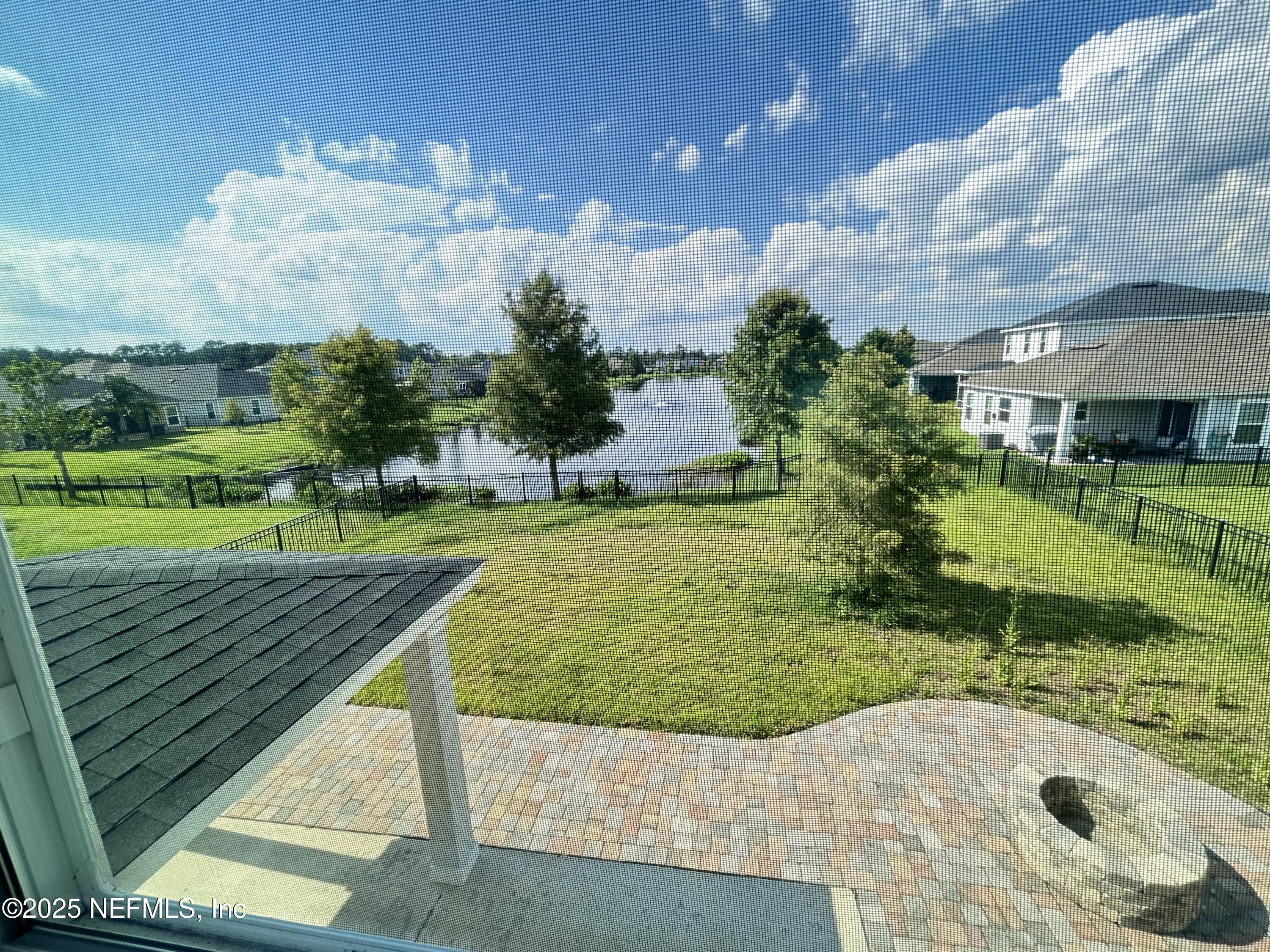 102 Bluejack Lane St. Augustine, FL 32095 - Photo 7 of 32 a view of a backyard with sitting area