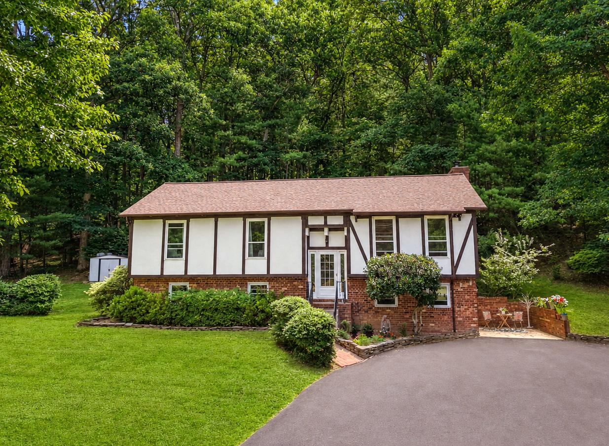 7357 Auburn Mill Road Warrenton, VA 20187 - Photo 2 of 35 Charming home nestled in lush greenery. 50 yr roof