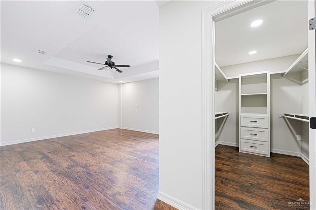 2216 South 45th Street McAllen, TX 78503 - Photo 12 of 34 an empty room with closet and wooden floor