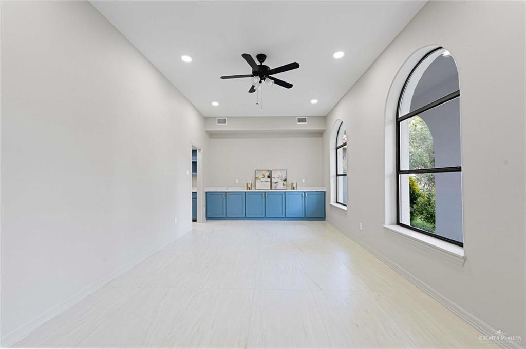 2216 South 45th Street McAllen, TX 78503 - Photo 14 of 34 wooden floor in an empty room with a window