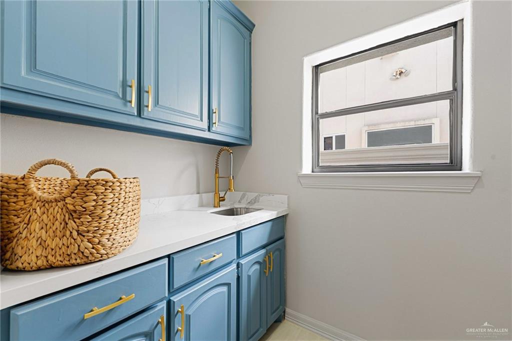 2216 South 45th Street McAllen, TX 78503 - Photo 27 of 34 a sink with a cabinet