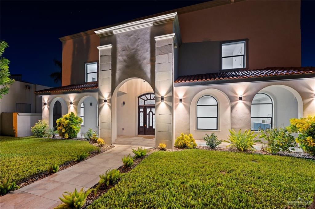 2216 South 45th Street McAllen, TX 78503 - Photo 31 of 34 a front view of a house with garden