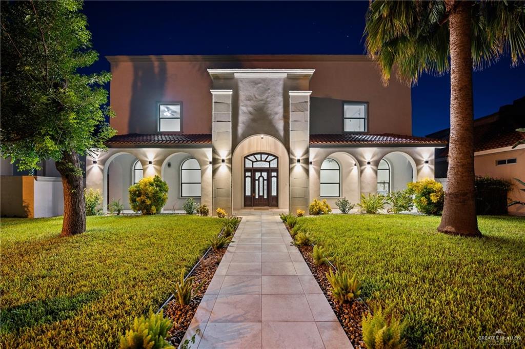 2216 South 45th Street McAllen, TX 78503 - Photo 33 of 34 a front view of a house with garden
