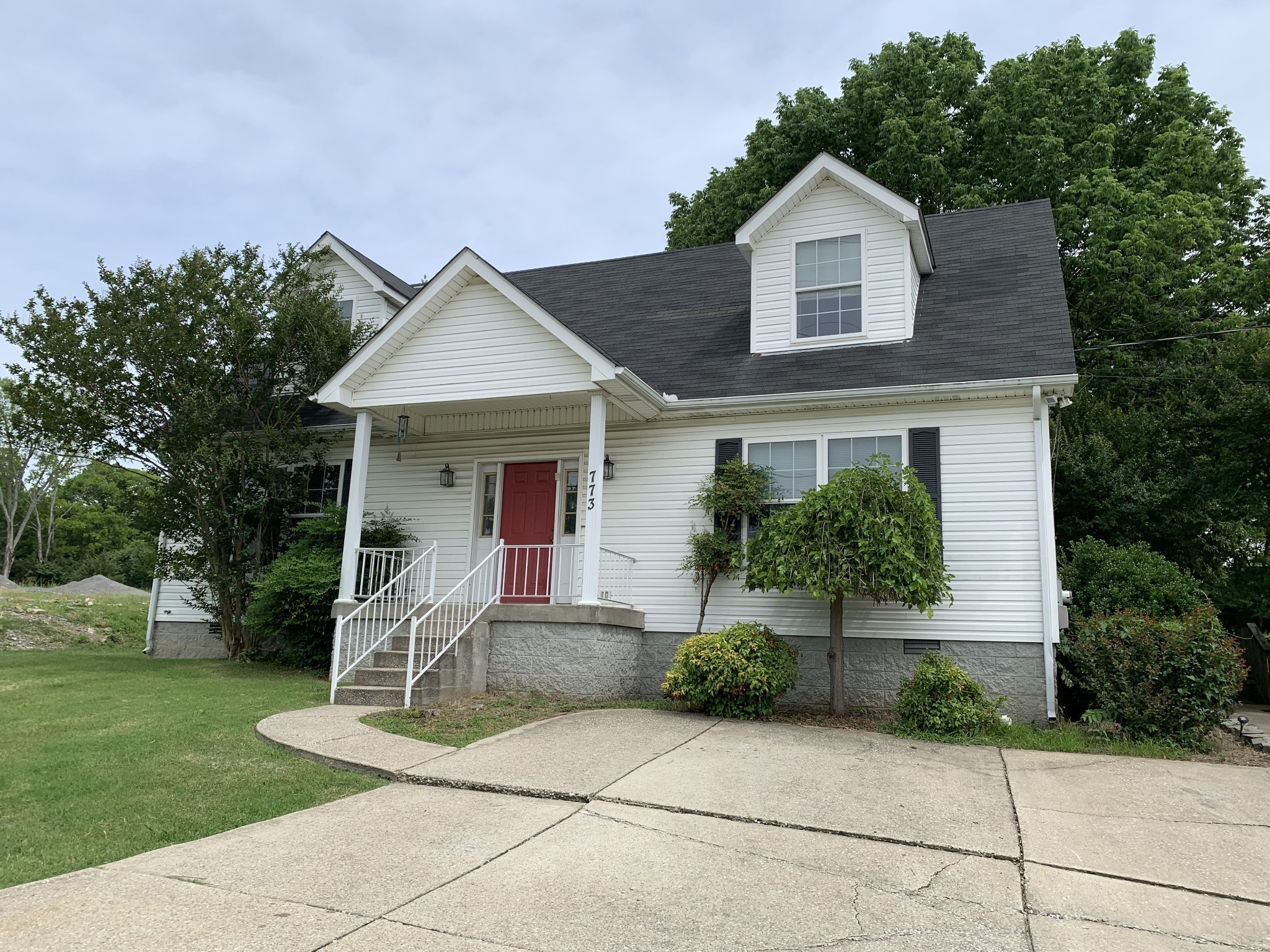 773 Curd Road Mount Juliet, TN 37122 - Photo 1 of 25 a front view of a house with a yard