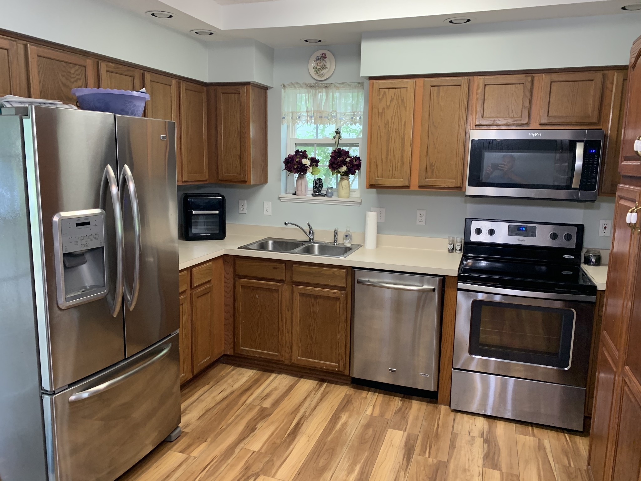 773 Curd Road Mount Juliet, TN 37122 - Photo 5 of 25 a kitchen with stainless steel appliances and wooden cabinets