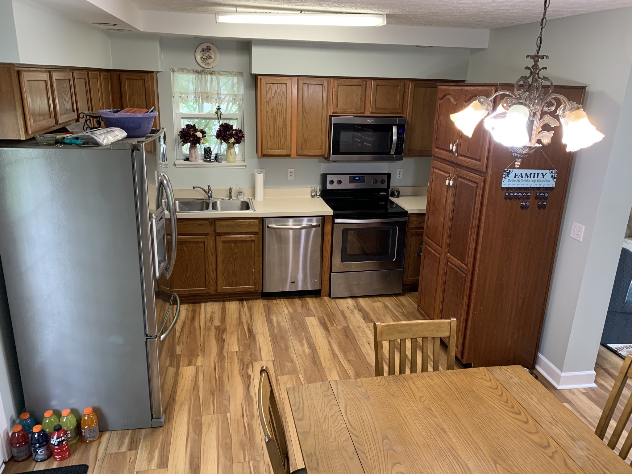 773 Curd Road Mount Juliet, TN 37122 - Photo 6 of 25 a kitchen with stainless steel appliances granite countertop a refrigerator a stove top oven a sink dishwasher and a microwave