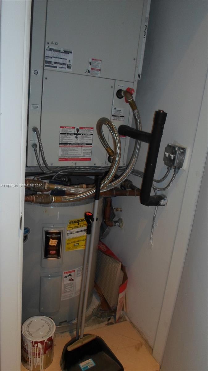 7275 Southwest 90th Way, Unit G 611 Miami, FL 33156 - Photo 17 of 56 a utility room with dryer and washer